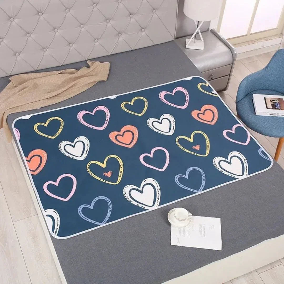 SnugglyNest™ – wodoodporna mata do przewijania dla dzieci w wieku 0+ – utrzymuje łóżko w suchości